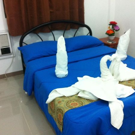 Rullan Apartelle Anda  Bilik gambar