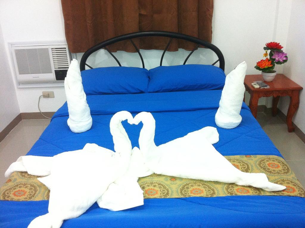 Rullan Apartelle Anda  Bilik gambar