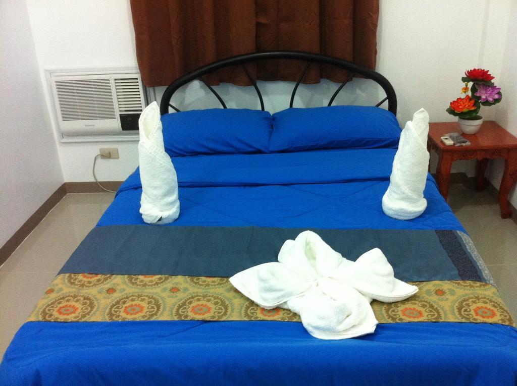 Rullan Apartelle Anda  Bilik gambar