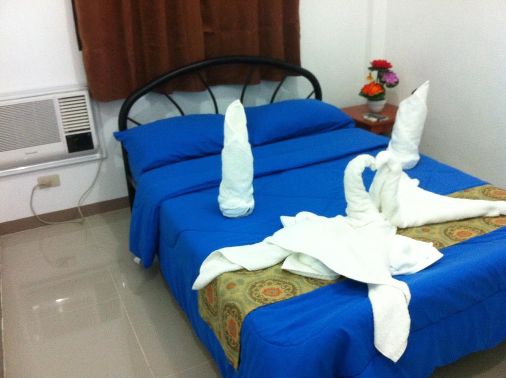 Rullan Apartelle Anda  Bilik gambar